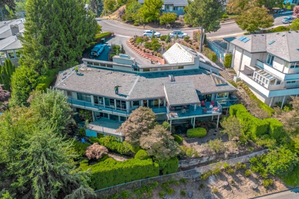 Drone view of beautiful home with new roof in Cherokee